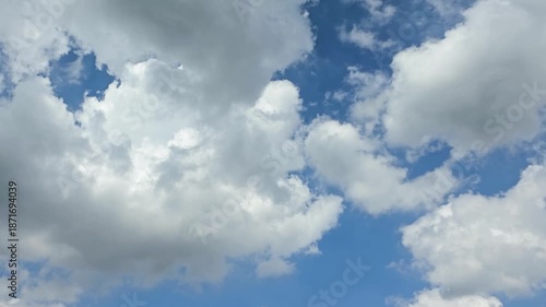 Timelapse, beautiful Blue Sky with white fluffy clouds, for a background	
