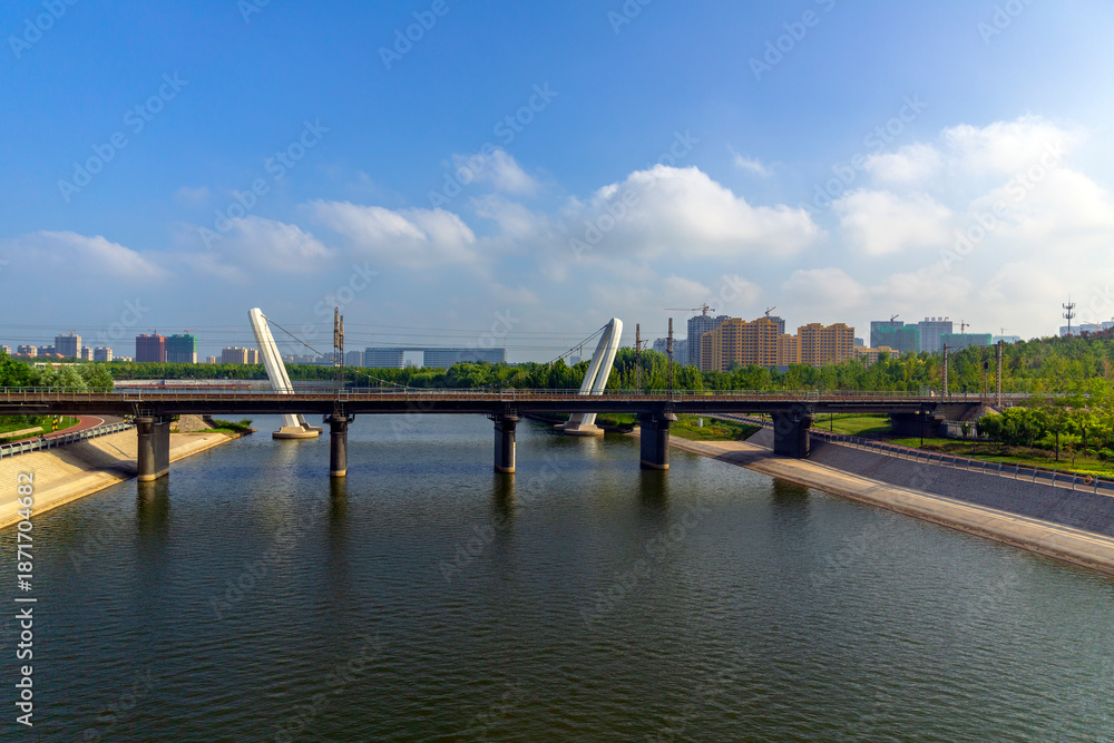 Fototapeta premium Urban River Bridge Reservoir And Highrise Buildings