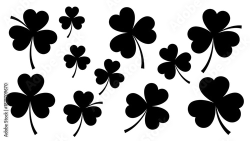 Collection of Black Silhouette Shamrocks and Four-Leaf Clovers on White Background