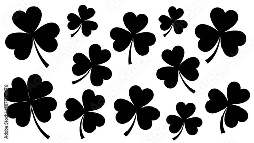 Black Silhouette of Shamrock and Four-Leaf Clover Symbols on White Background