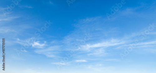 clear blue sky with  clouds