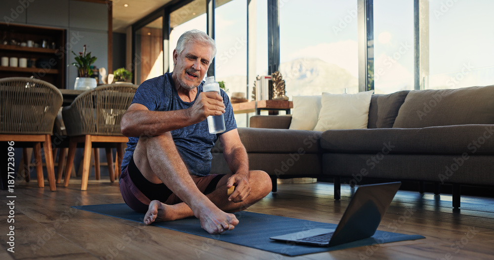 Fototapeta premium Old man, water and laptop at house for fitness, hydration and exercise break of online lesson. Senior person, rest and pc with refreshing beverage, training session and workout recovery for wellness