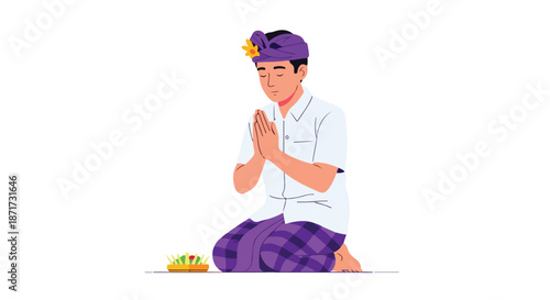 Balinese man praying with offering