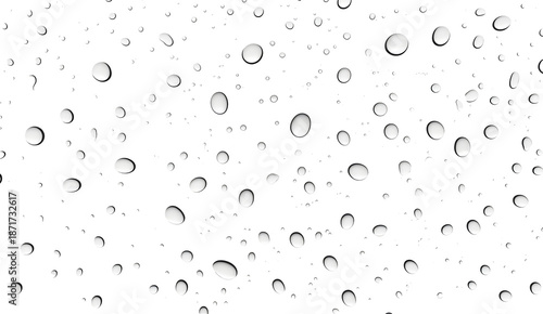 Water drops on clear surface many small and large droplets scattered closeup view transparent background