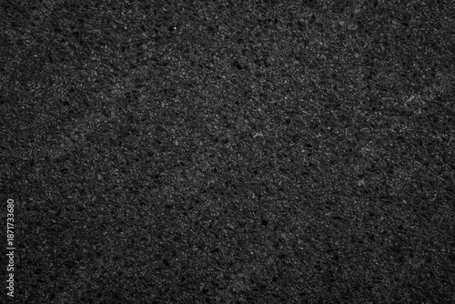 Rough asphalt road surface with concrete texture background. © r_tee