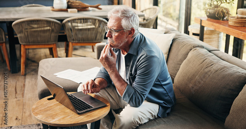 Obraz na plátně Old man, thinking and reading in home with laptop for asset management, retirement fund or prepare will