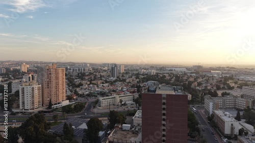 Aerial Sunrise Over Central Beersheba Skyline, Israe, Urban Cityscape at Dawn
