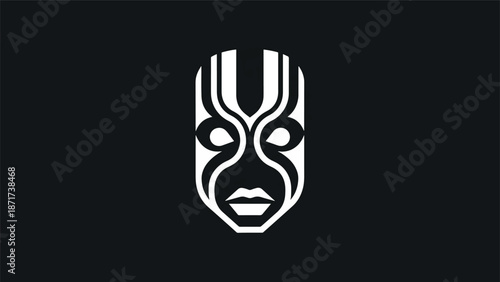 Intricate tribal mask design with symmetrical patterns and cultural significance on a dark background.