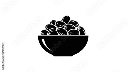 A black bowl filled with a pile of olives on a white background for food and cuisine designs with cooking and healthy and eating and meal and snack