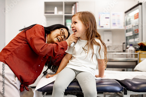 Happy Aussie kid at gp doctors appointment having a checkup