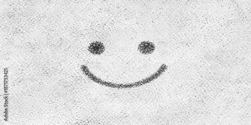 A black and white winter pattern shows a heart shape footprint track pressed into the cold frost texture of snow on the snow