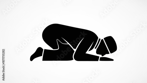 Black silhouette of a person kneeling in prayer on a white background with copy space with religion and faith and worship and spirituality and islam