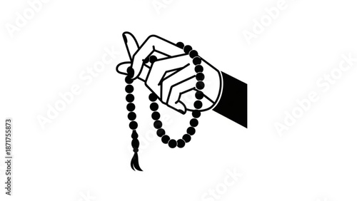 A hand holding black prayer beads on a white background for spirituality and meditation with hand holding beads and calm and serene and peaceful
