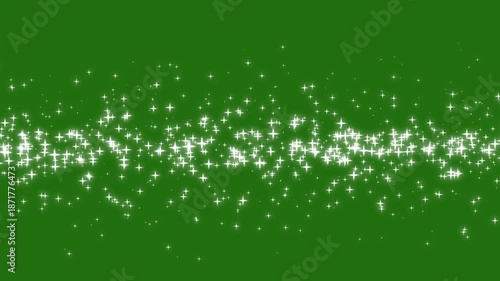 Glittering star effect, magical starlight on green background
