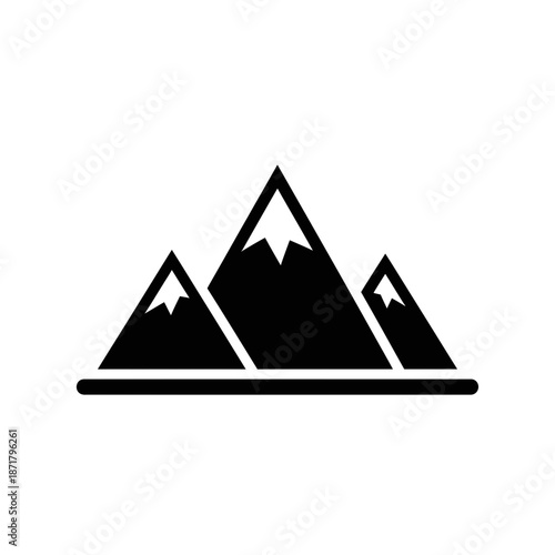 High quality professional stock photo of a young businesswoman using a laptop while sitting in a modern sunlit office workspace