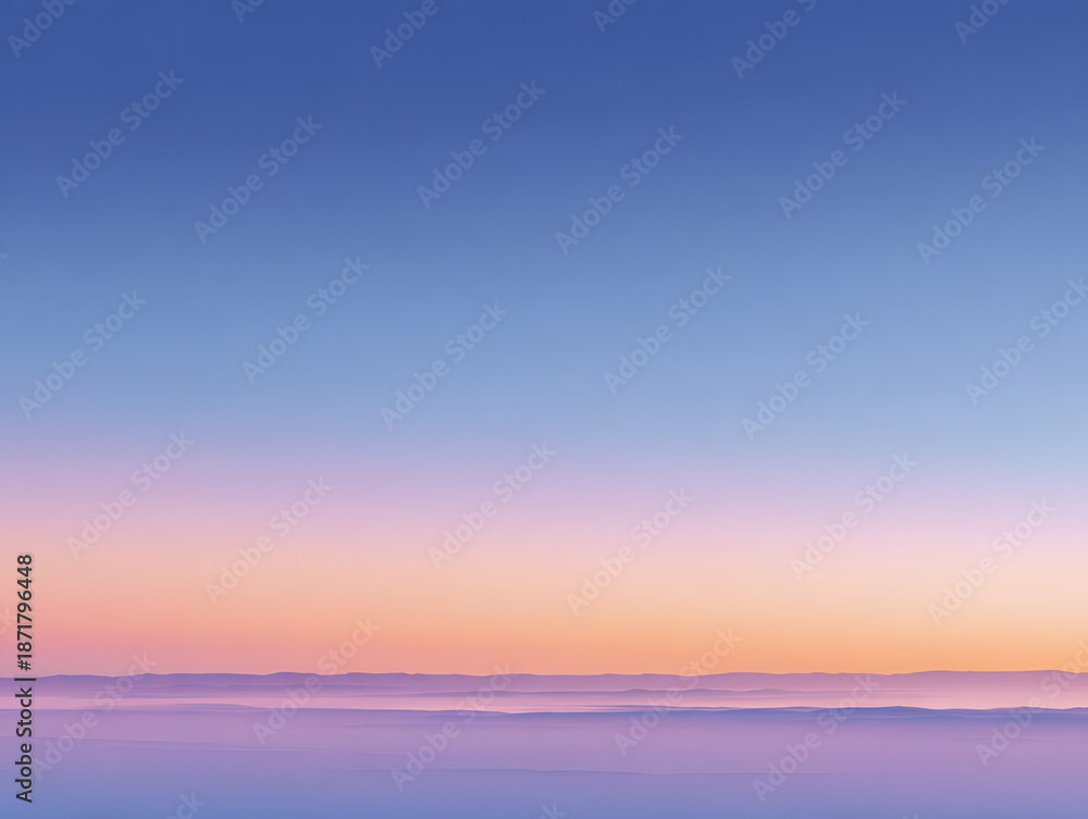 Fototapeta premium Calm Blue Pink Sky Gradient over Misty Mountain Range at Sunset