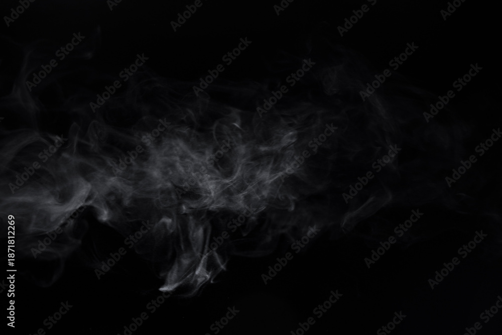 Obraz premium Wide vapor overlay with layered white smoke forming a hazy cloud across center on black, rich atmospheric fog texture for dark fantasy scenes, horror posters, cinematic lower thirds and title graphics