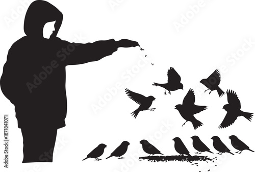 Silhouette of person feeding birds in winter landscape