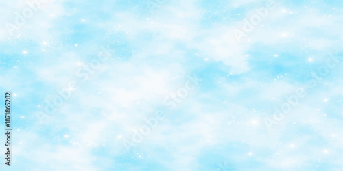 Abstract blue bokeh backgrounds blend with a beautiful summer cloudscape where fluffy white clouds float through a bright sunny sky for a natural heaven-like feel