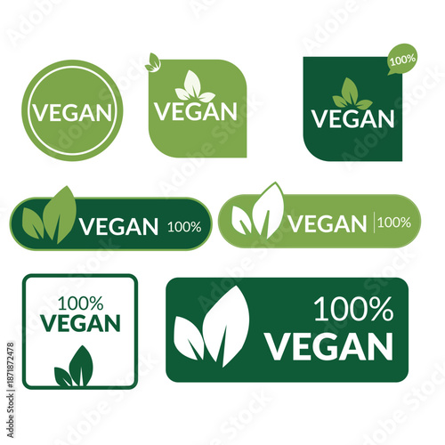 Collection of various green vegan labels and stickers on a white background showcasing different designs and typography
