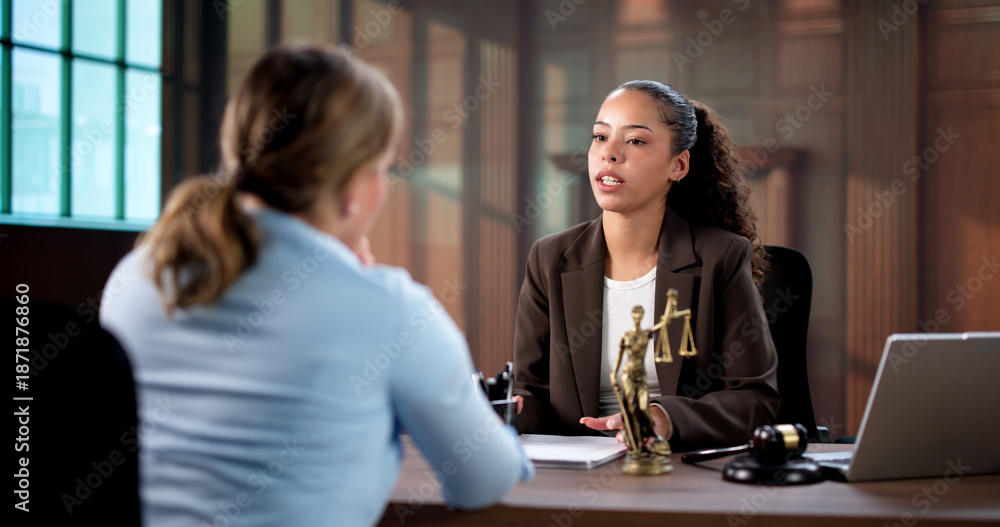 Fototapeta premium Woman Seeking Guidance From Lawyer During Court Mediation