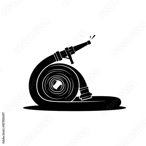 A coiled black fire hose with a nozzle a symbol of emergency response