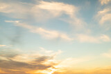Low angle view of beautiful clouds pattern in sky at sunset