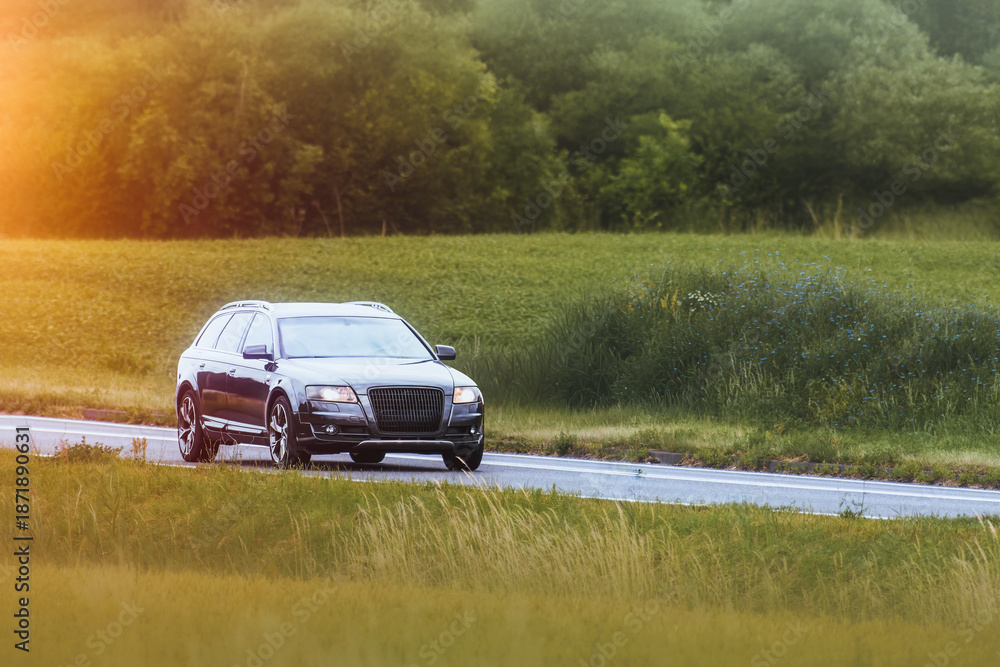 Fototapeta premium Eco friendly station wagon in rural environment