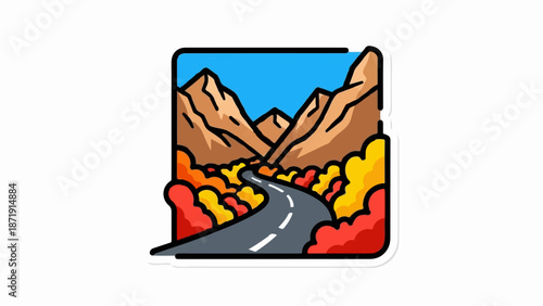 Winding road through colorful autumn mountains under a clear blue sky