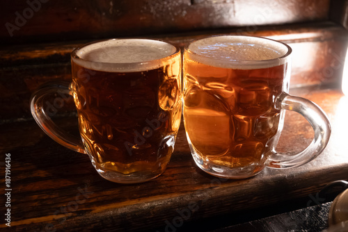 Classic London pub crawl with friends, enjoying cask ales and lively atmosphere of traditional British pubs, grasses of cask ales beer from barrels