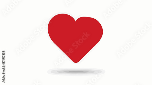 A red heart symbol on a white background with a subtle shadow effect