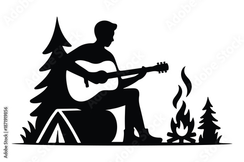 Silhouette of Person Playing Guitar by Campfire with Tent and Trees