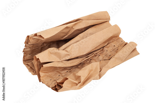 Crumpled brown kraft paper box filler on white background.