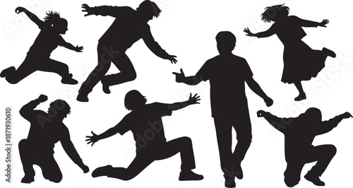 Silhouettes of people jumping and dancing with joy