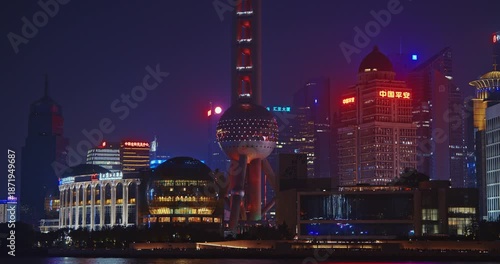 Intriguing Night View of Shanghai with Tower and Glowing Cityscape Lights