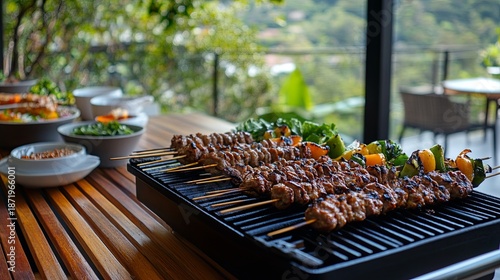 Wallpaper Mural BBQ grill with skewers of grilled meats and fresh vegetables served on a wooden table . Torontodigital.ca