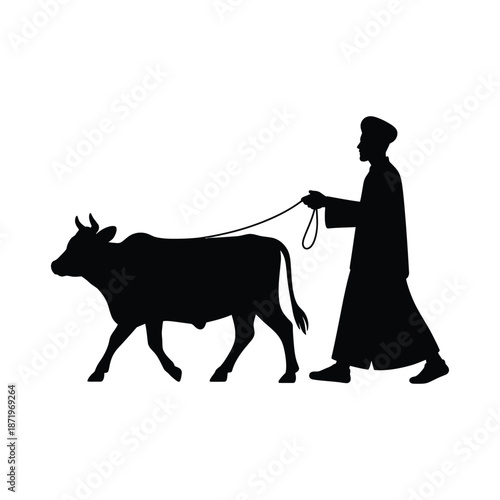 A silhouetted image depicts a man leading a cow showcasing a rural and traditional scene
