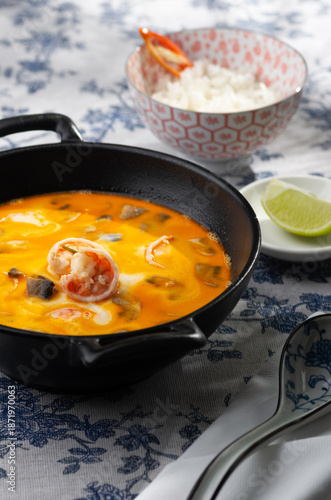 Tom yum soup. Thai cuisine. Healthy eating. Recipes. National cuisine background Restaurant table