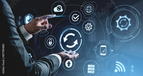 Foto Businessman interacting with digital data synchronization interface concept on futuristic blue background with technology and cloud computing icons