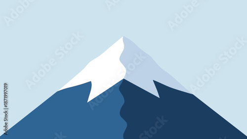 Majestic Blue Mountain with Snow-Covered Peak Against a Light Blue Sky