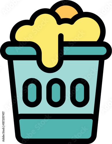 Overflowing popcorn bucket spilling delicious popcorn, perfect for a cinema or movie night