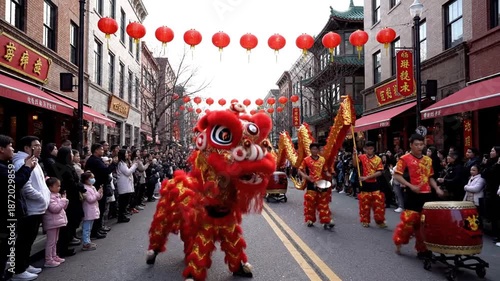 Vibrant Chinese lion dance performance on bustling street during celebration