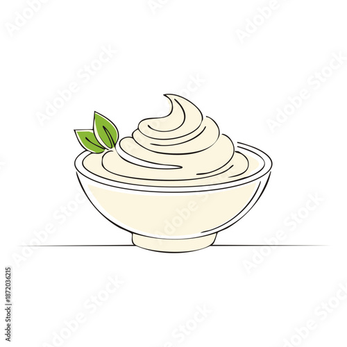 Simple creamy white dip in a bowl topped with green herbs served as condiment or dessert for Adobe Stock