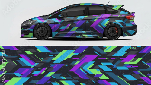A car with a vibrant, abstract, geometric wrap design featuring purple, blue, and green fragmented patterns.