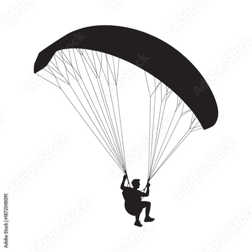 A silhouetted image depicting a person enjoying the thrill of paragliding in the open sky