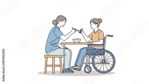 A caregiver is feeding a person in a wheelchair at a table, illustrating care and assistance.