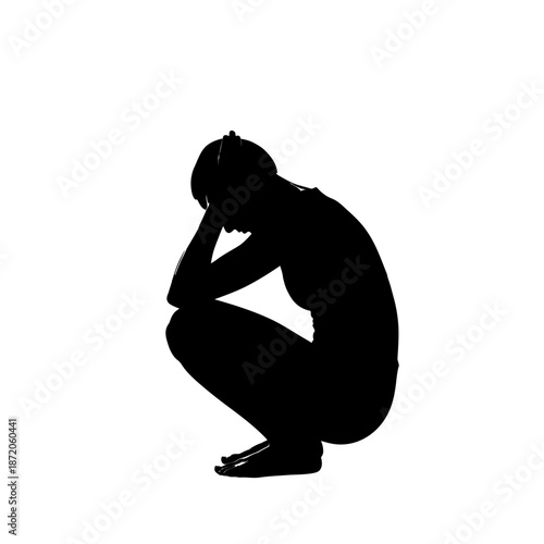 Silhouette of a woman in distress, head in hands.