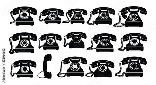 Vintage black rotary telephones in a variety of styles and positions