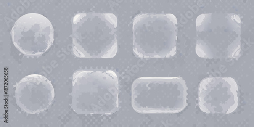 An arrangement of translucent textured geometric shapes on a gray surface