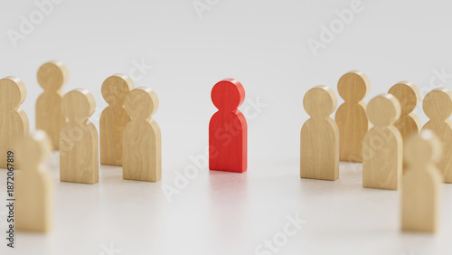 Red Figure Stands Apart: Among Light Wooden Group